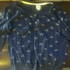 Blue cardigan with bike pattern